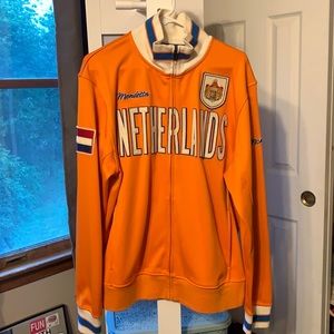 Mondetta Orange, Blue, Cream Netherlands jacket.